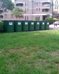 Seven compost bins in Peace Park, one for each day of the week