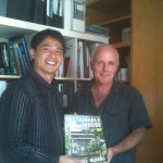 A delegate buys a signed copy of Sustainable House