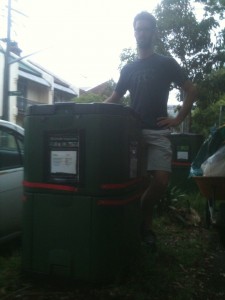 Michael with two heavy duty tapes screwed around the bins