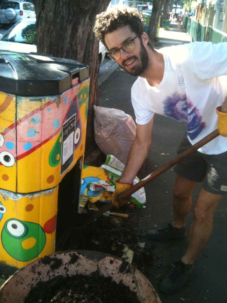 Mike Simonds emptying a road garden compost bin in Chippendale