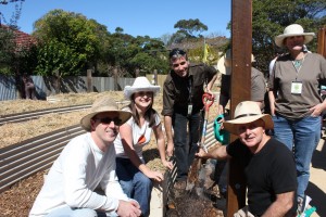 Planting the grapevine; L to R:  Mayor Michael Regan, Cr Virginia Laugesen (and the main mover for the garden), David Sawyer (Community Garden co-ordinator), Jenny Brown (asst. co-ordinator), and behind the pole, watering, Anne-Marie McArdle, grapevine in hand with Michael Mobbs